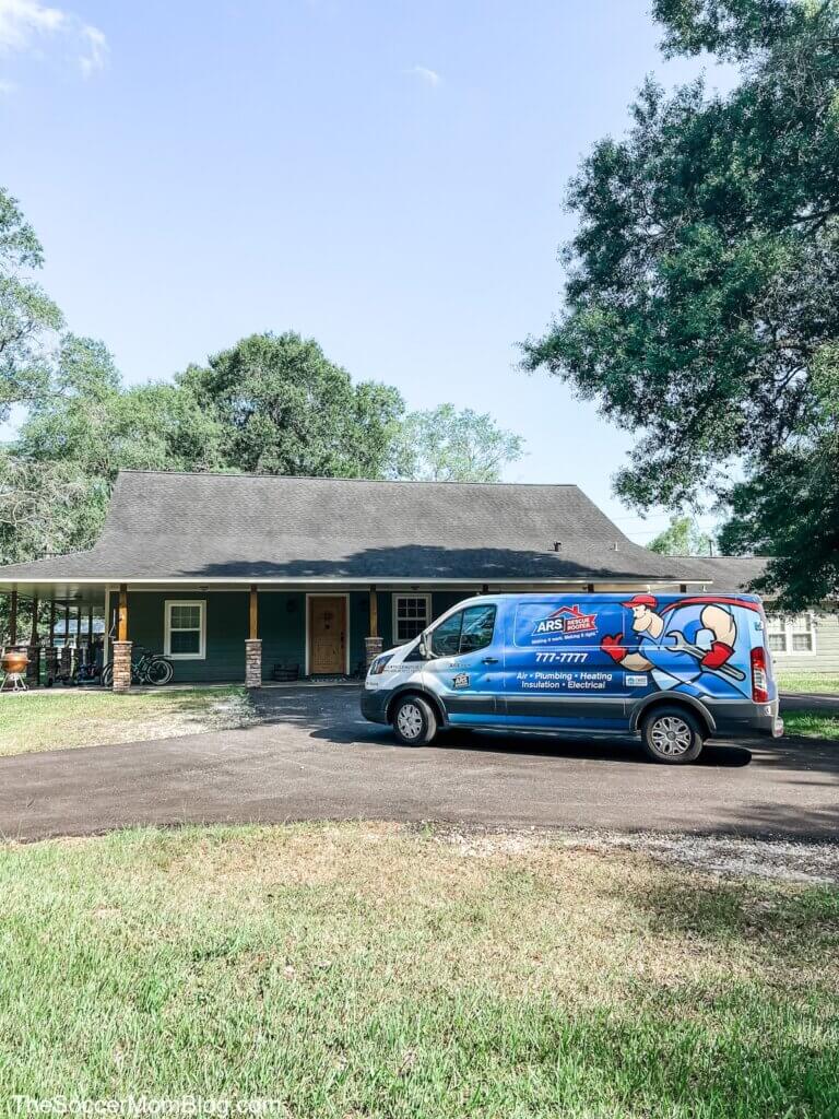 ARS/Rescue Rooter van in front of house