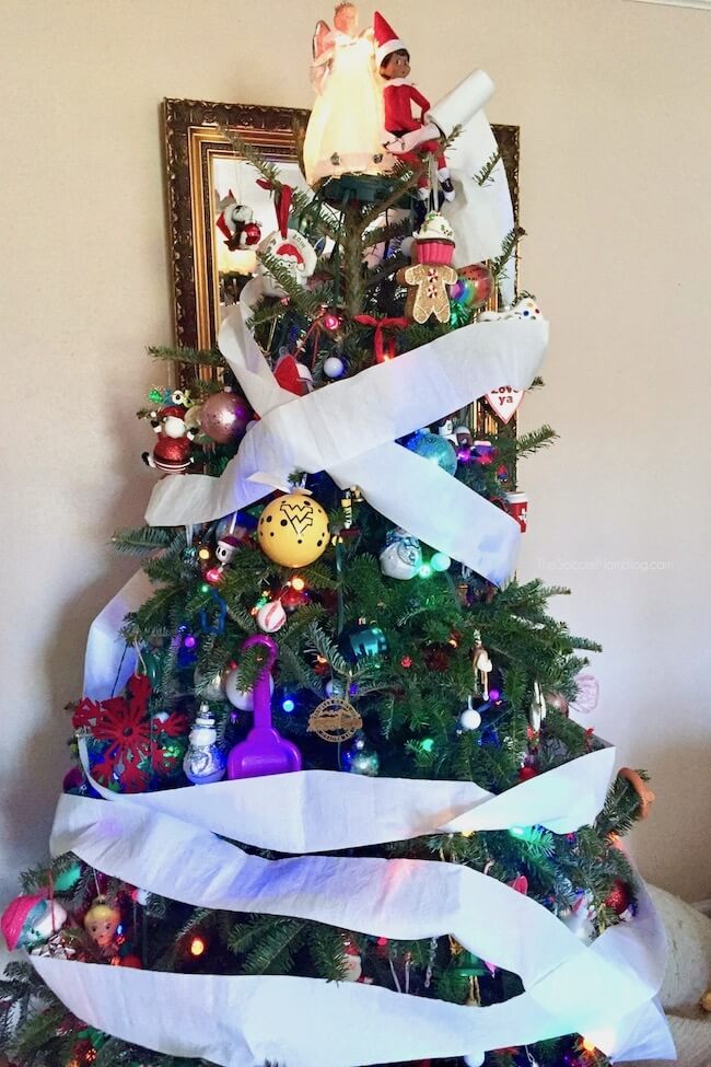 Elf on the Shelf toilet papering the Christmas tree