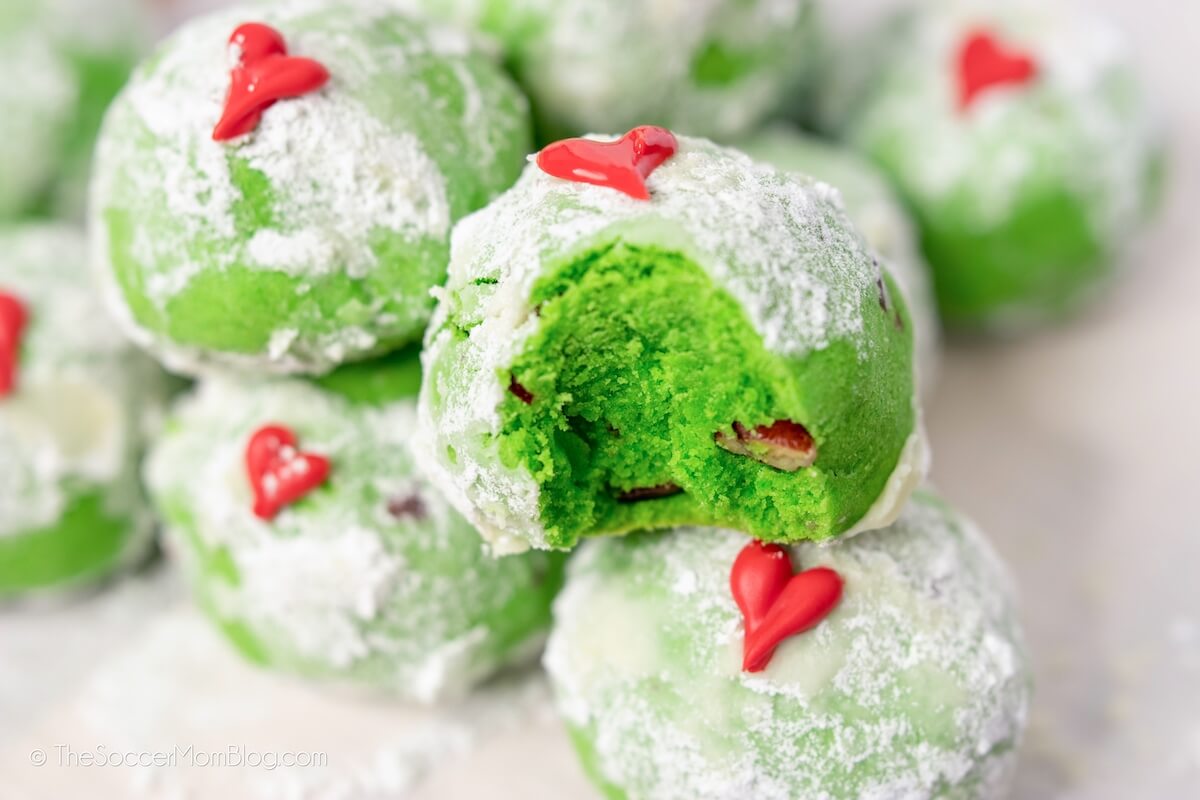 bright green Grinch Christmas cookies on plate