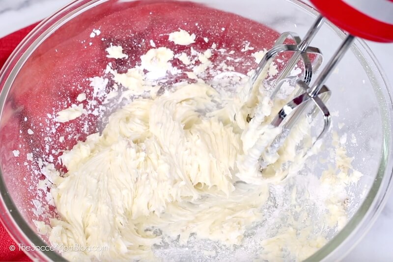 creaming butter and powdered sugar with hand mixer.