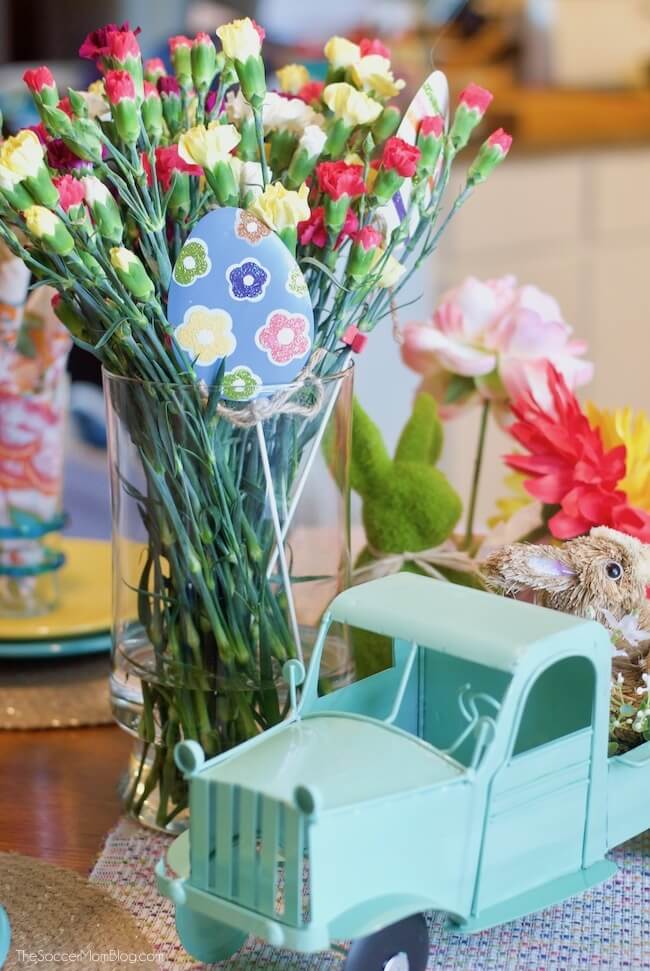 These folded bunny napkins add a whimsical touch to your Easter table - and they're easy to make! Keep reading for photo step-by-step instructions, plus more tips for creating gorgeous (and affordable) Easter decor. 