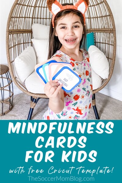 little girl with mindfulness activity cards