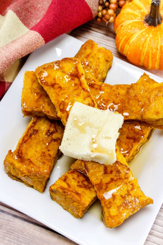 The ultimate Fall breakfast!! These delightful Pumpkin French Toast Sticks will totally make you feel all warm and fuzzy inside!