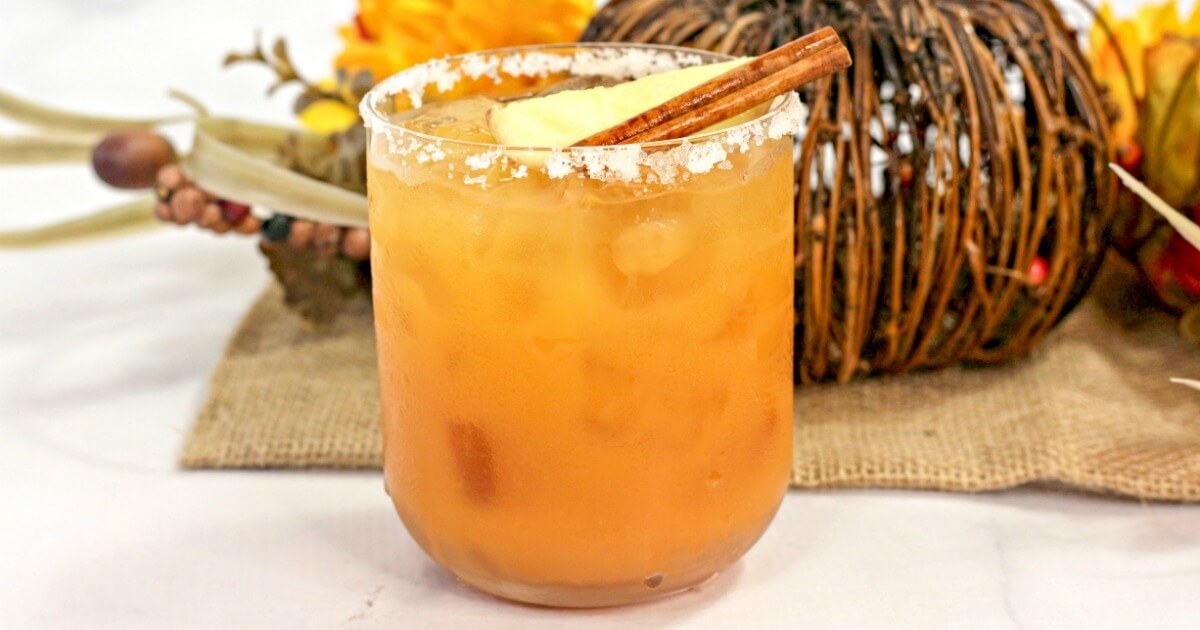A smooth, sweet, and spicy fall themed cocktail, this Thanksgiving Margarita is a treat for the taste buds! One of the most unique margarita recipes you'll ever try!