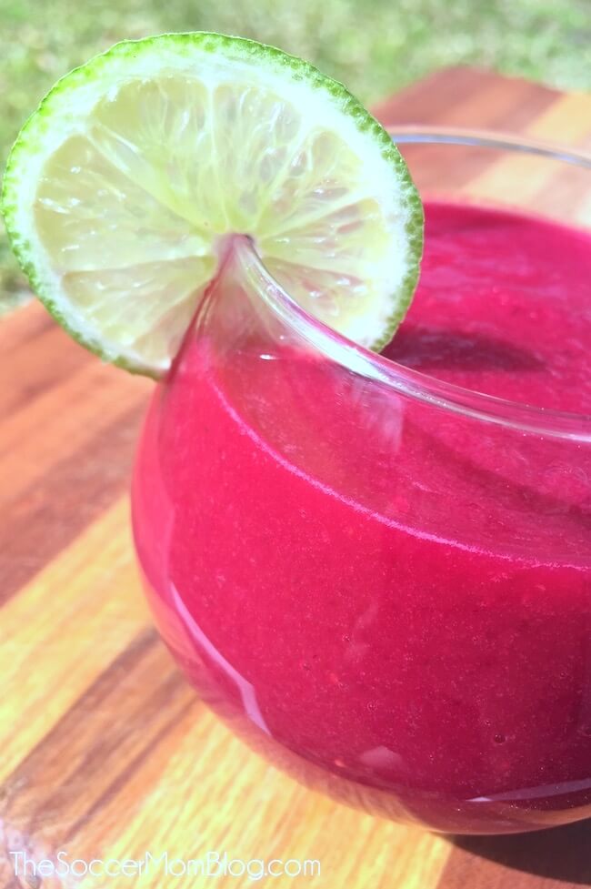 cleansing beet smoothie in a glass with lime